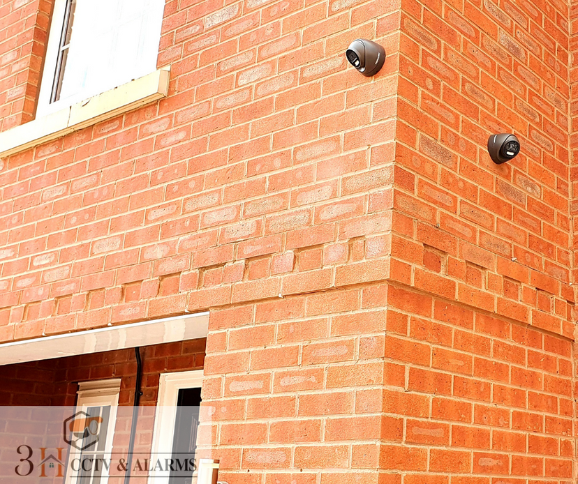 Two CCTV cameras installed on front elevation of home in Hucknall